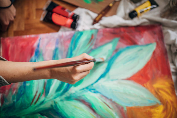 Abstract multicolored background made with acrylic paints. Colored volumetric strokes in a chaotic manner. Blurred image.