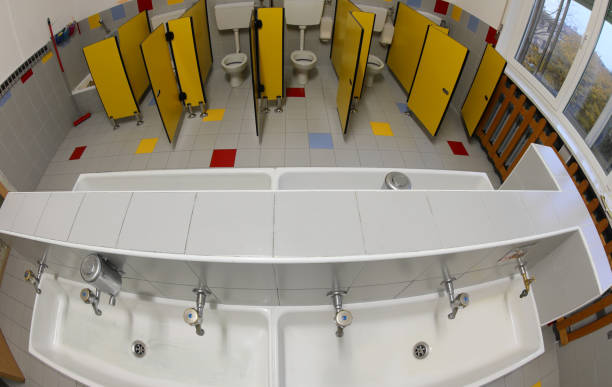 istock bathroom of a nursery school with small sinks and yellow doors p 1245914837
