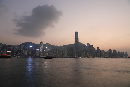 Hong Kong city skyline Victoria Harbor sunset dusk