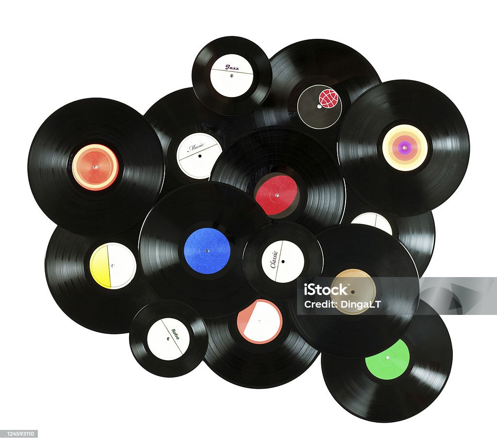 Vinyl records Abstract music background made of vintage vinyl records, isolated over white background, all labels designed by myself Record - Analog Audio Stock Photo