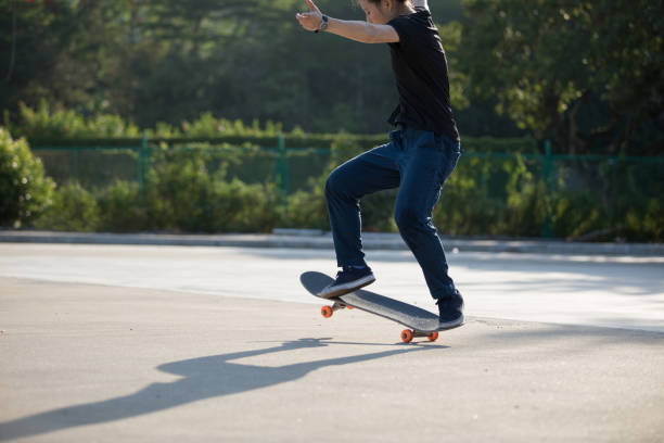 istock Skateboarder legs skateboarding at outdoors 1245932484