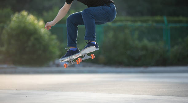 istock Skateboarder legs skateboarding at outdoors 1245941098
