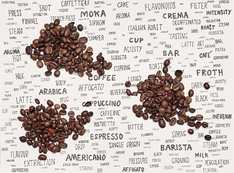 coffee beans and coffee words on paper