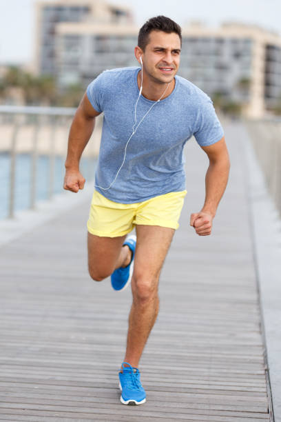 istock Man listening music on workout 1245946565