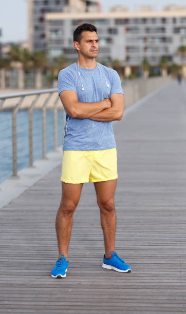 istock Sporty man posing outdoors 1245946591