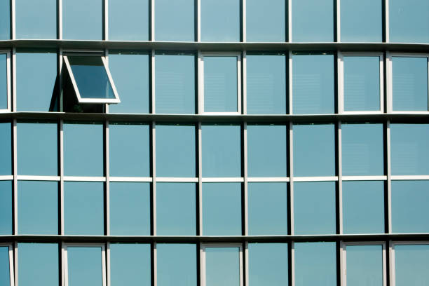 Back side view of residential building with sky as background.