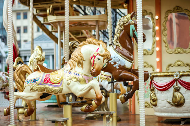 istock Vintage carousel merry-go-round painted horses 1245973127
