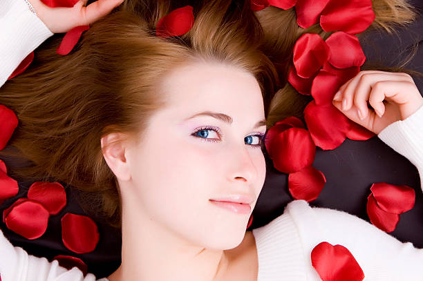 istock woman in rose petals 124601103