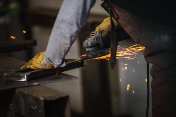 istock Metal Worker with the grinder 1246011397