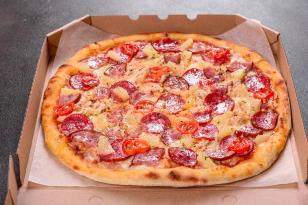 istock Pepperoni Pizza with Mozzarella cheese, salami, ham 1246016801