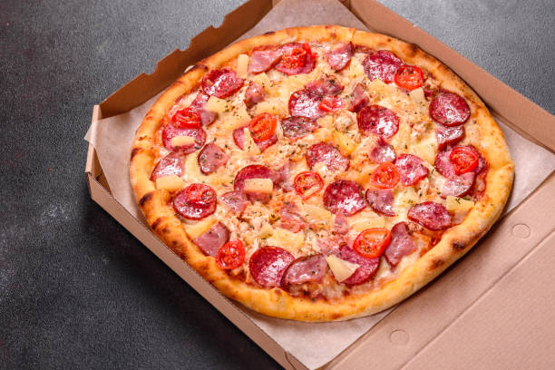 istock Pepperoni Pizza with Mozzarella cheese, salami, ham 1246017911