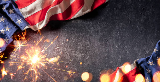 istock Usa Celebration With American Flag And Sparkler 1246028309