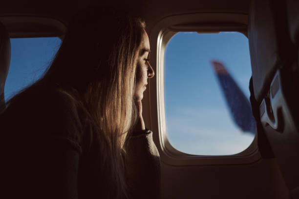 istock Young woman travelling with airplane 1246029535