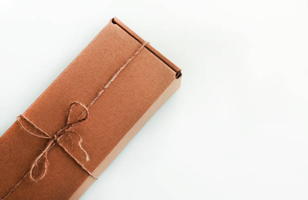 istock the brun squared present box with jute rope on a white background 1246030894