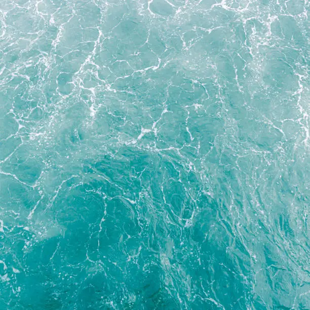 Turquoise green sea water, abstract  nature summer textured background