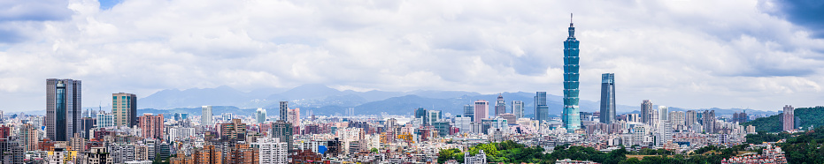 The iconic view of  Taipei downtown skyscrapers overlooking the crowded cityscape. Taiwan’s vibrant capital city.