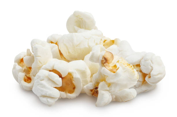 istock Close-up of delicious popcorn heap on white 1246079116