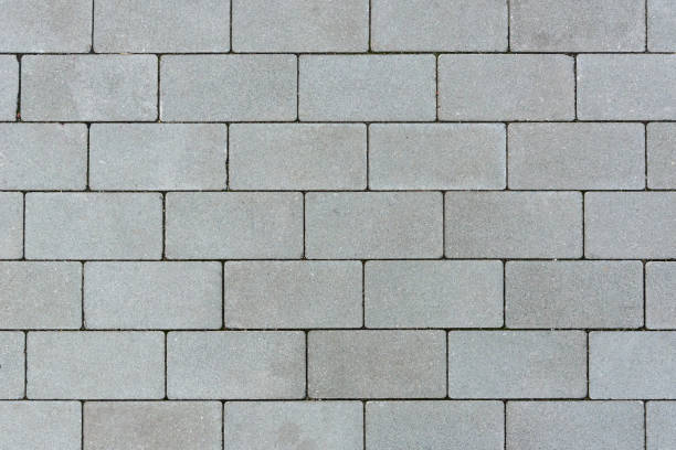 istock Background or texture made of gray sett pavement 1246100121