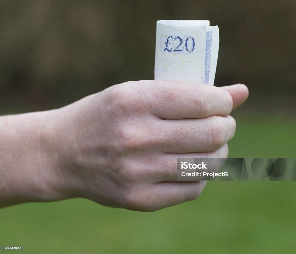 Loadsa money tight grip on her money. Bringing Home The Bacon Stock Photo