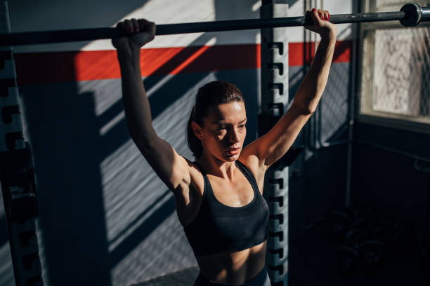 istock Fit young woman training alone in gym 1246128858