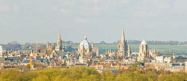 City of Oxford Spires Panoramic view of the city of Oxford, England. Featuring Christ Church college, Racliffe camera and other spires. oxford university photos stock pictures, royalty-free photos & images