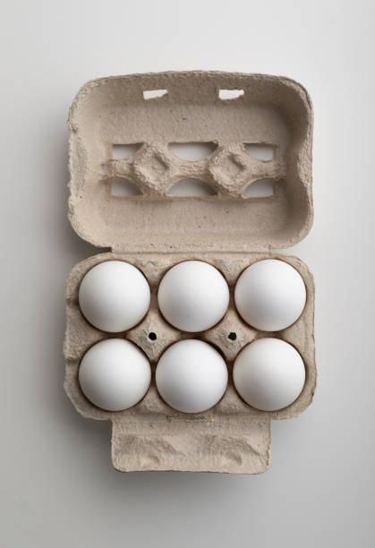 istock Six white chicken eggs in pater tray 1246151691
