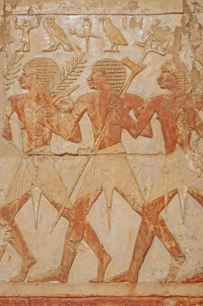 istock Hieroglyphic carvings on an ancient egyptian temple wall 1246191288