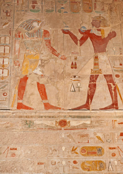 istock Hieroglyphic carvings on an ancient egyptian temple wall 1246194557