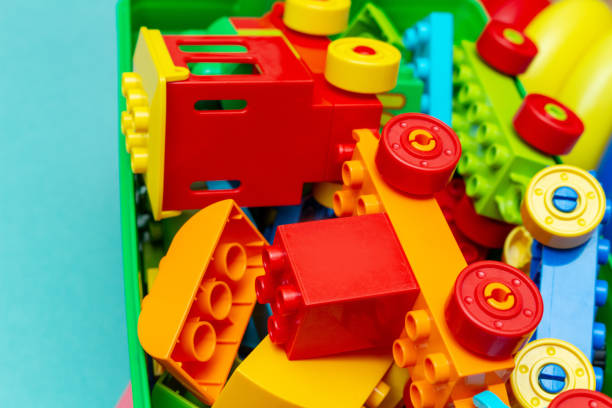 istock pack of colorful child kids education toys constructor train pattern background on the bright color background close up. Childhood education play infancy children baby concept 1246197417