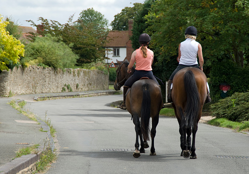 Two women out for a countryside hack.