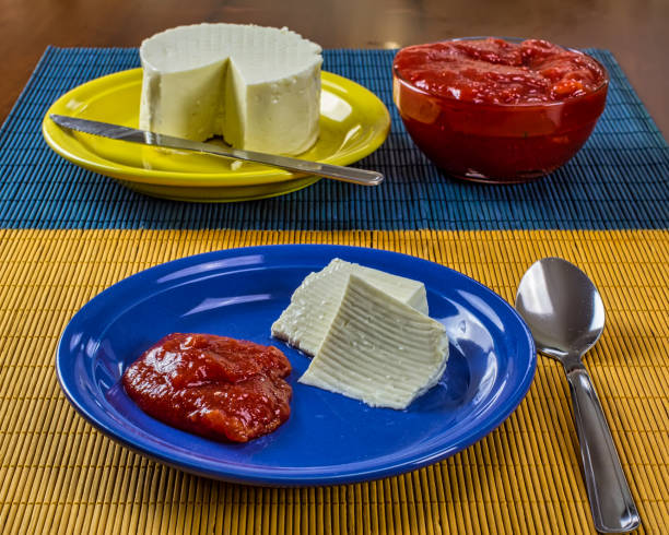 istock Guava paste with cheese, aka Goiabada com queijo minas frescal, in top view. Typical dessert from Minas Gerais / Brazil sweet pasty guava accompanied by fresh cheese. 1246217173