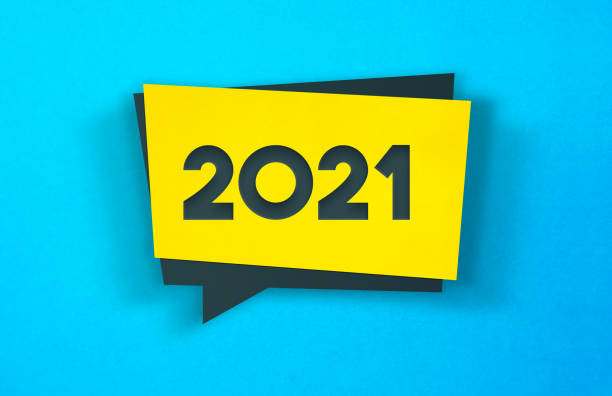 istock Yellow Label Sticker On A Blue Background. 2021 Concept. 1246226113