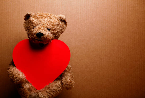 istock image of toy bear paper heart 1246230437