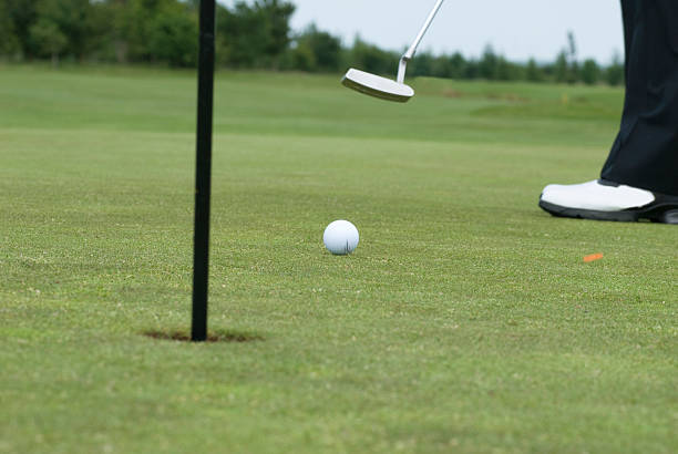 Putting shot golf ball hit by club