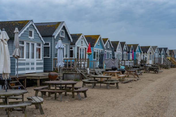 istock Beach Huts at Hengistbury Head Spit. 1246285138