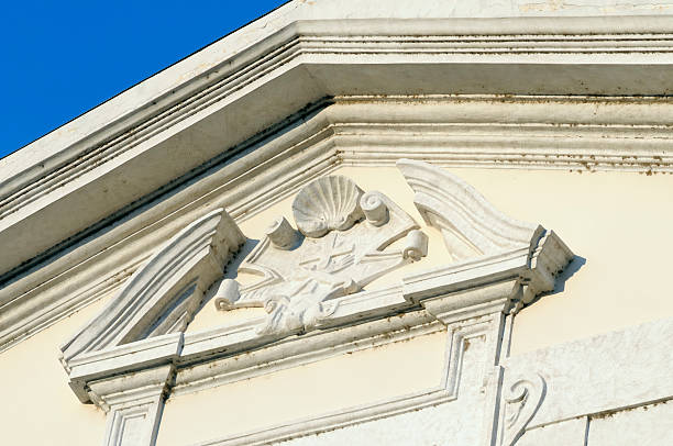 istock catholic symbols on church facade 124629826