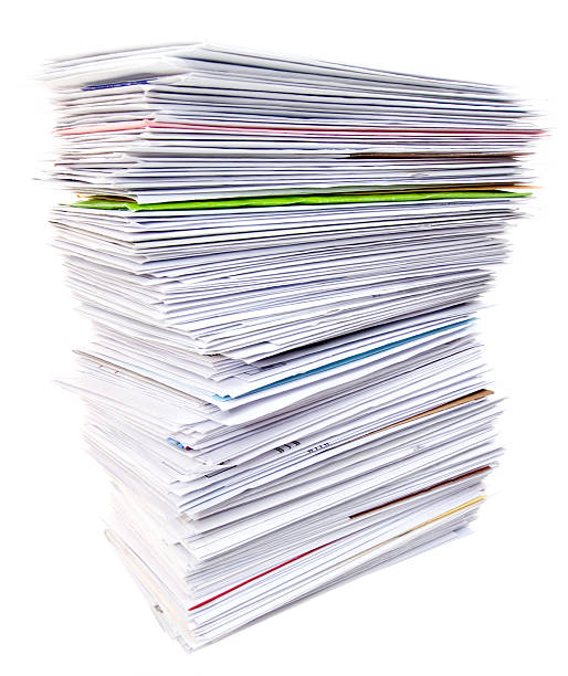 istock Big Stack of Unpaid Bills and Envelopes Isolated on White 124629856