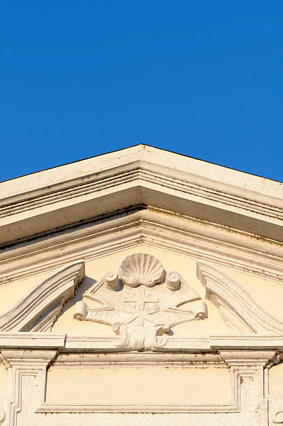 istock catholic symbols on church facade 124629935