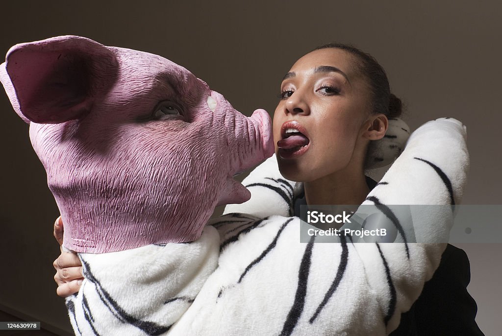 Women with cuddly toy Serreal pose involving young Women and Piger. Embracing Stock Photo