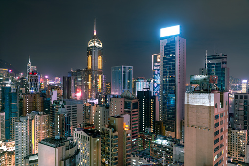 The amazing night and sunset view of cityscape and skyscrapers in Hong-Kong