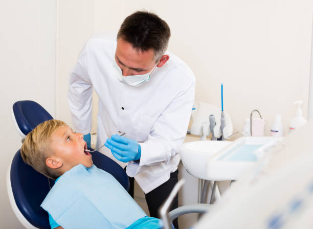istock Professional in uniform is examinating patient 1246358233