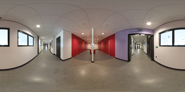 360 degree panoramic sphere photo of the Whitcliffe Mount Primary School showing the entrance to the boys and girls modern toilets in the corridor of the British School