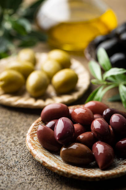 istock Black and green olives 1246371293