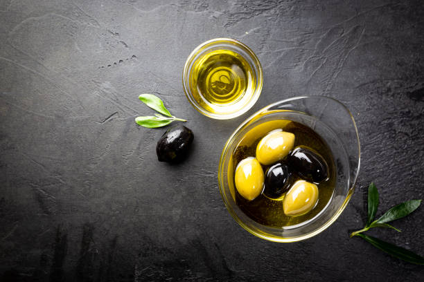 istock Black and green olives 1246371312