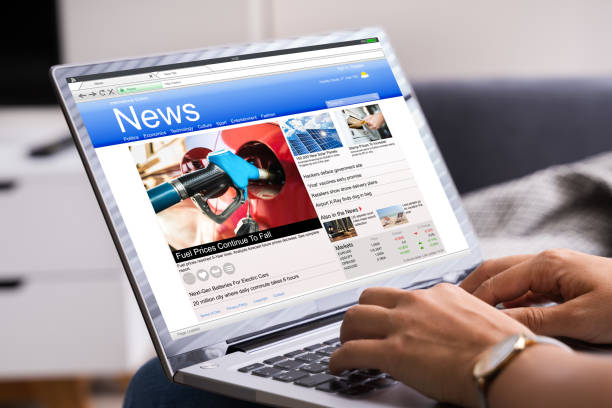 istock Reading Online News Website On Computer 1246372581