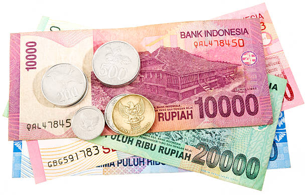 indonesische rupiahs - indonesian currency stock-fotos und bilder