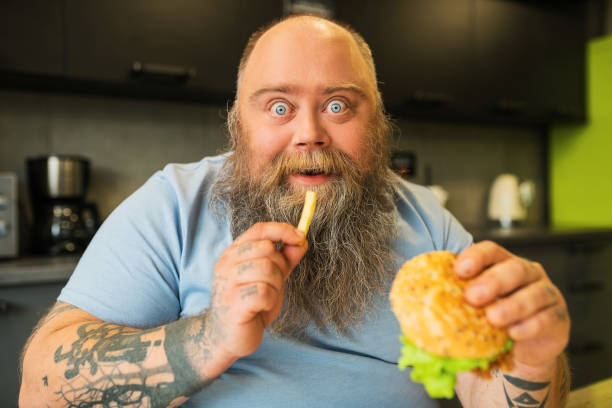 3,186 Overeating Funny Stock Photos, Pictures & Royalty-Free Images - iStock 3,186 Overeating Funny Stock Photos, Pictures & Royalty-Free Images - iStock