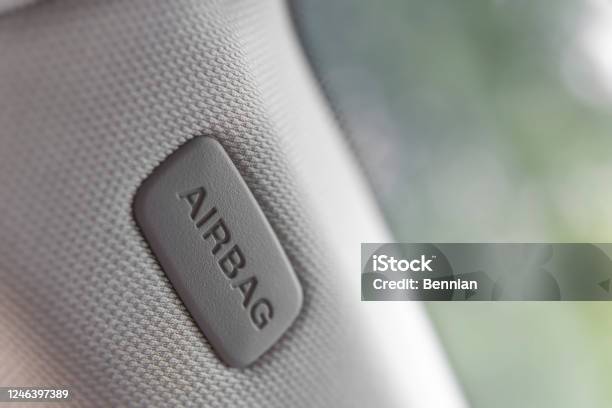Airbag Sign On The Side Of Door Of The Vehicle Stock Photo - Download Image Now - Airbag, Safety, Bag