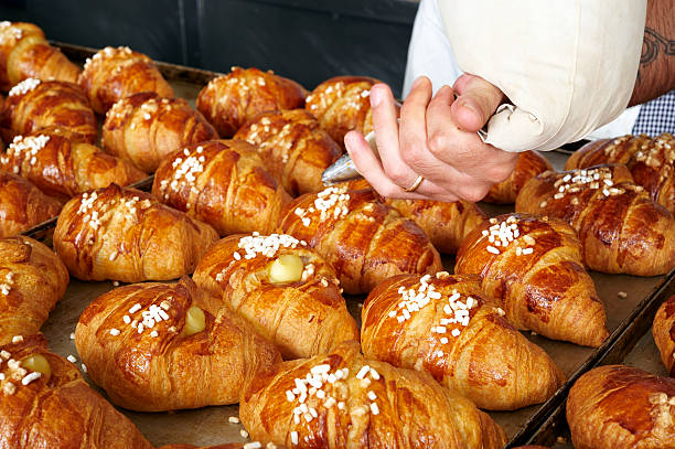istock Filling Croissants with Cream 124640103