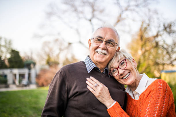 Portrait of a senior couple. Portrait of a senior couple looking at the camera falling in love photos stock pictures, royalty-free photos & images